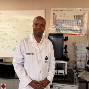 Picture of Prof. Legoabe in his laboratory with the Buchi C-950 chromatography system.
